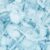 A close arrangement of clear ice cubes filling the space with light blue tones and frosty textures across the surface.